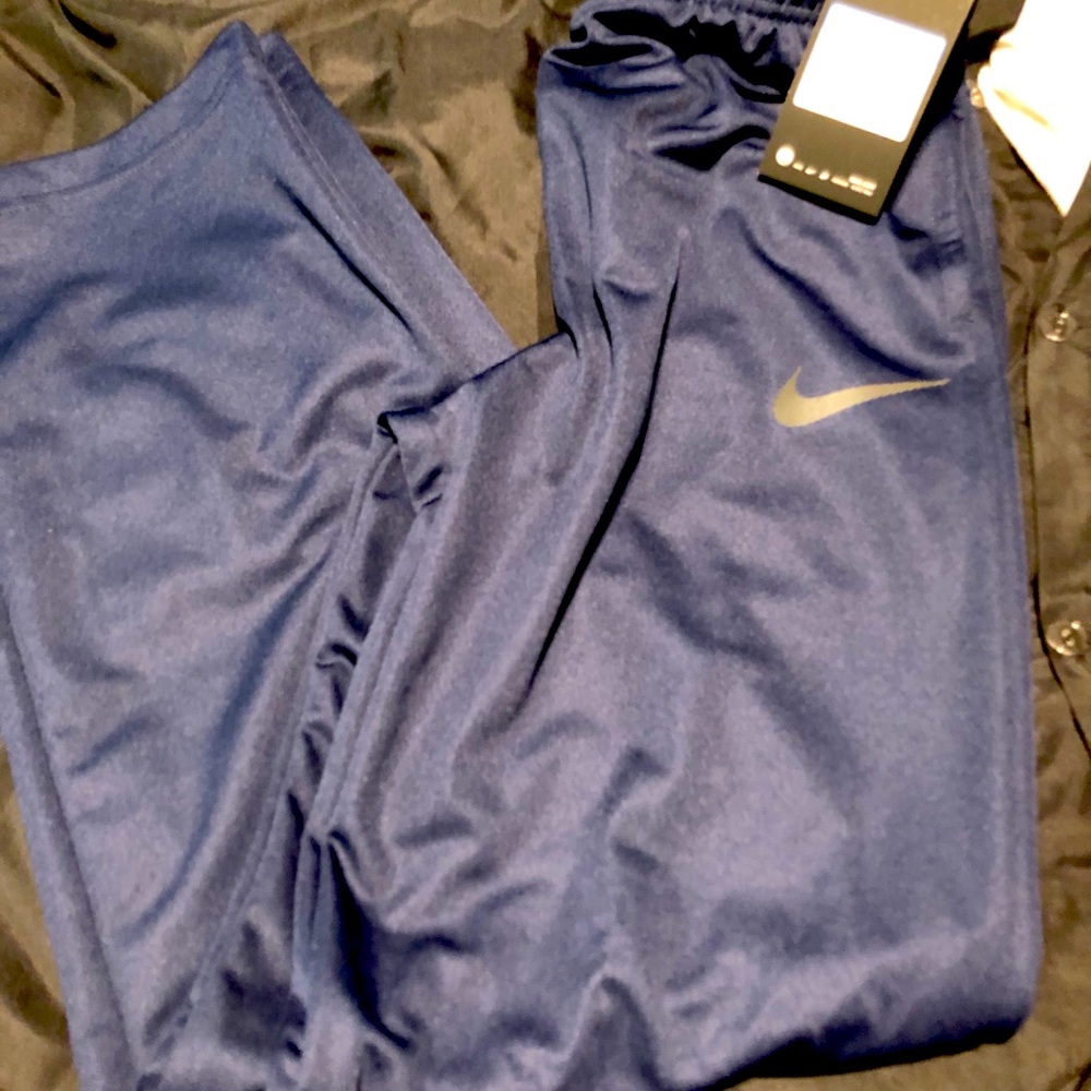 Nike track suit pants med.